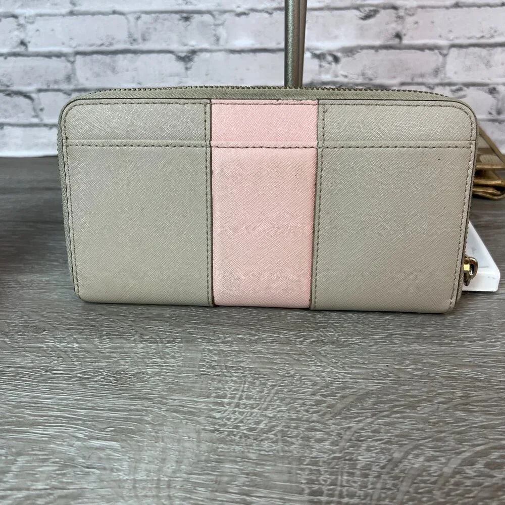 Kate sapde Accordion zip around wallet clutch